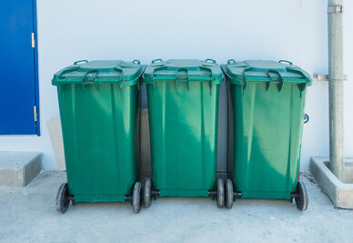 Green recycle bin or three trash bins Container