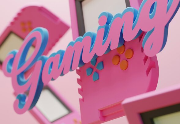 Composition 3D avec le mot « Gaming » en lettres stylisées entourées de manettes et d'écrans aux teintes rose et bleu - Agrandir l'image, fenêtre modale
